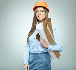 Young business woman engeneer, architect holding rolled up technical drawing.