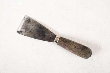 Old dirty and rusty putty kniffe