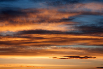 Gray, red and orange clouds in the sky