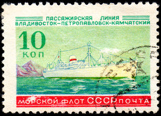 UKRAINE - CIRCA 2017: A postage stamp printed in USSR shows Soviet Liners Ship and Inscription Soviet Navy, Passage line Vladivostok - Petropavlovsk-Kamchatsky, from the series Ships, circa 1959