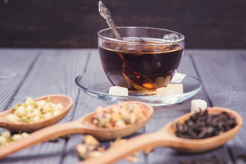 Dry tea in spoons