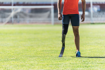 Close up disabled man athlete with leg prosthesis.