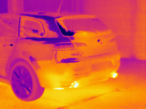 Thermal image of exhaust system on rear end of car