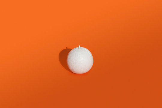 Orange painted white on orange background