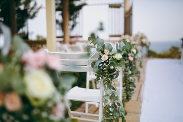 Decoration of chairs at the wedding