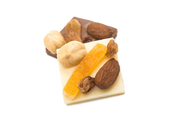 Chocolate with nuts and raisins isolated