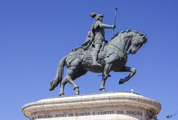 Monument and statue on the Figueira Square in Lisbon