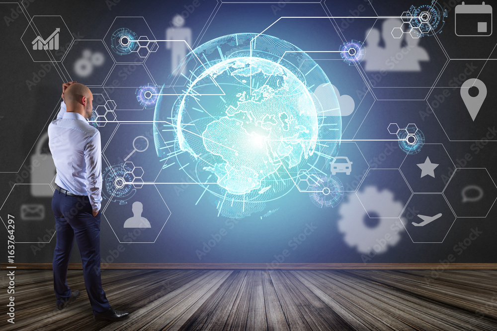 Poster businessman in front of a wall with an international business network connection displayed on a futu