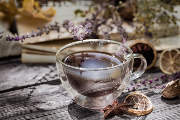 cup of tea with autumn leaves