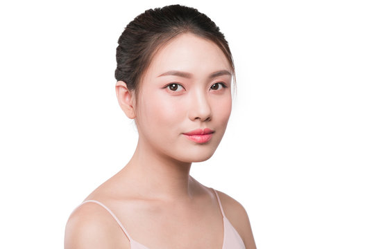 Smiling asian woman with natural looking makeup