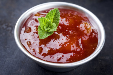 Traditional Indian Mango Chutney as close-up in a bowl