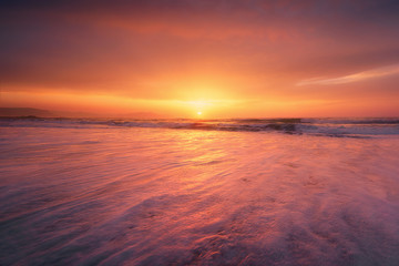 Fototapeta na wymiar sunset on beach shore