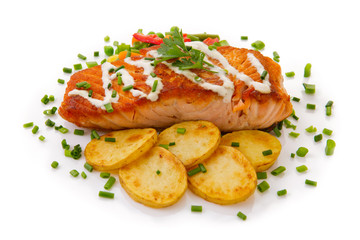 Salmon Steak with Vegetables and fried potatoes.