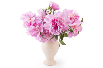 Bouquet of beautiful pink peony flowers, Paeonia lactiflora, i a vase isolated on white background