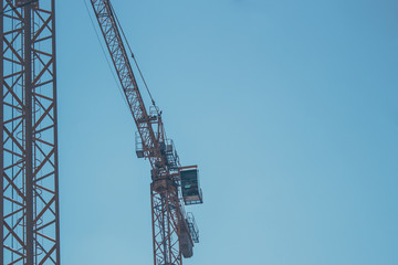 Fototapeta na wymiar Lifting crane in the sky