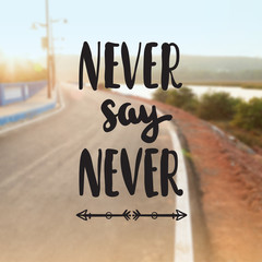 Motivational Quote on purple color background Never say Never 