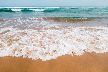 scenic view of water waves in the beach