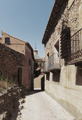 Narrow street of old town in summer