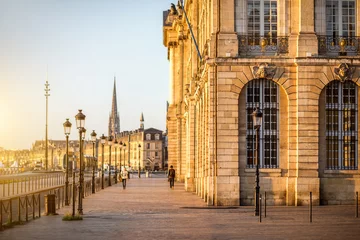 Poster Street view ner the famous La Bourse square during the morning in Bordeaux city, France © rh2010