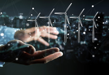 Businessman holding renewable energy sketch