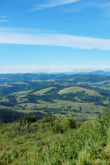 Fototapeta na wymiar View from the Hemba mountain over Carpathian villages and peaks