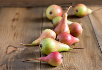 Pears on a rustic wooden background Beautiful fruit Place for text
