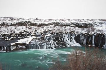 Fototapeta premium Hraunfossar waterfall in winter iceland