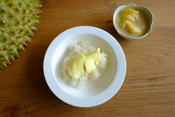 Sticky rice toping with durian in the coconut milk