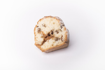 Cupcake with raisins and caramel in a cut isolated on a white background