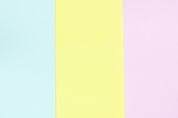 pink and yellow and blue paper