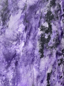 black and purple texture of charoite stone