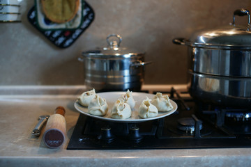 Mantas, Mantoux or Buz, postures are a traditional meat dish of the peoples of Central Asia, Turkey, Mongolia, Korea, Tatarstan, Bashkortostan, Crimea, Kyrgyzstan, Kazakhstan and in China 