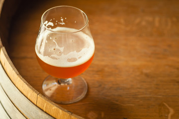 Amber ale on a barrel