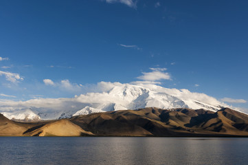 Obraz premium The Karakul Lake in the province of Xinjiang in Northwestern China; Concept for travel in China