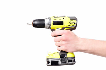 Tool for drilling in yellow color held in males hand