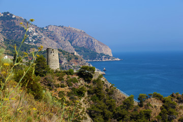 Andalsian coast with old tower and sea