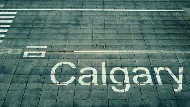 Aerial view of big airplane arriving to Calgary airport. Travel to Canada conceptual intro animation