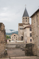 Fototapeta na wymiar Cluny abbey in France, Burgundy, entry porch and view of the church 