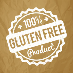 Gluten FREE Product rubber stamp white on a crumpled paper brown background.