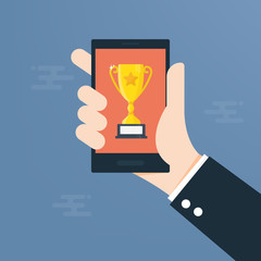 Man hands using a phone showing a cup