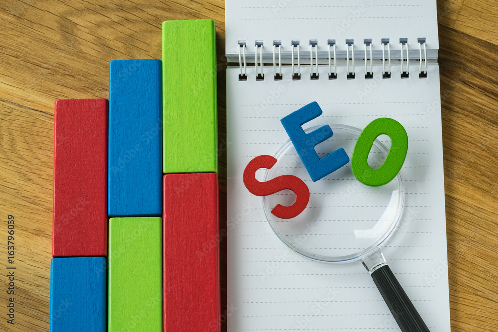 Poster seo search engine optimization concept as colorful alphabet abbreviation seo on magnification glass 