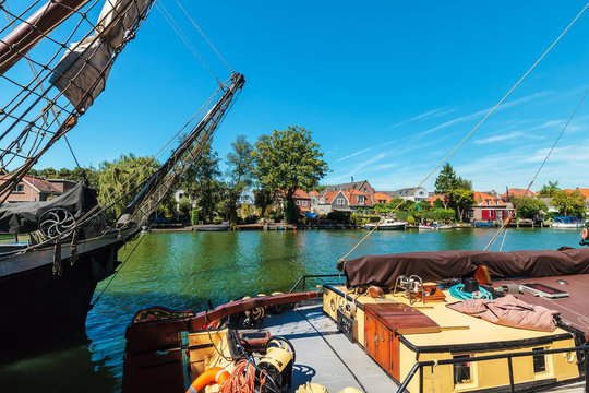 Ancient sailing ships on the Dutch river Vecht