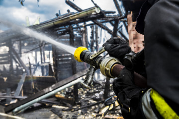 Firefighter extinguishes fire