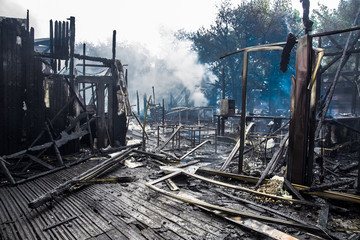 Fototapeta na wymiar interior of burned-down wooden house