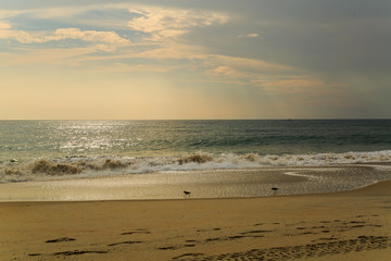 Fototapeta na wymiar Beach scene in Nags Head NC sunrise on a clear blue day
