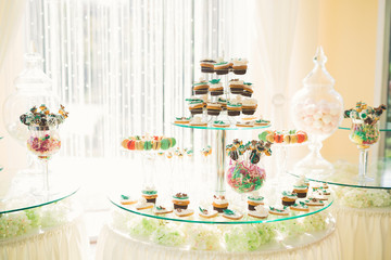 Different kinds of baked sweets on a buffet