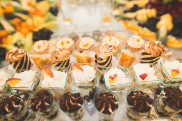 Different kinds of baked sweets on a buffet