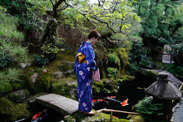 japanese young woman kimono in japanese garden
