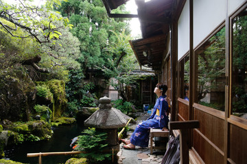 japanese young woman kimono in japanese garden