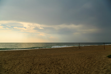 Beach scene in Nags Head NC sunrise on a clear blue day